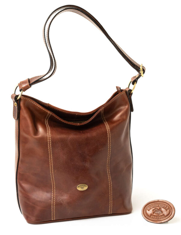 Machiavelli Master Leatherworkers Tuscan Artisans Seams 101 youth bucket bag one large pocket in natural brown genuine vegetable tanned leather front view